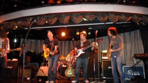 Tyrone Wells jamming with some other musicians on the boat.